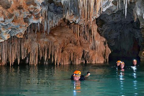 Photo Swimming Through Caves At Rio Secreto An Underground River In