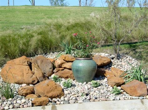 Rock garden designs front yard with flower bed and green grass plus potted plants front yard landscaping with rock. 18 Simple Small Rock Garden Designs