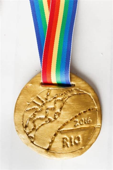 Here's a felted medal craft to do with the kids, that results in a safe medal that all ages can wear with pride! Fun Olympic Craft for Kids and Parents