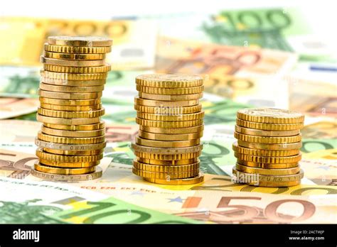 Stack Of Money Coins Sinking Curve Stock Photo Alamy