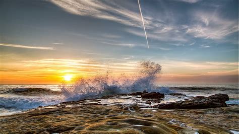 Hd Wallpaper Wave Breaking On Rocky Shore At Sunset Sea Tides On Sea