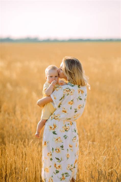 Mother Walks With Her Baby Among Wheat Field Stock Photo Image Of