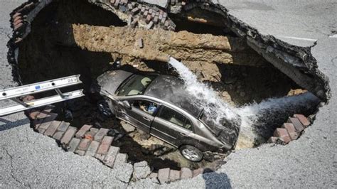 Womans Amazing Escape From Massive Sinkhole In Road Cbbc Newsround