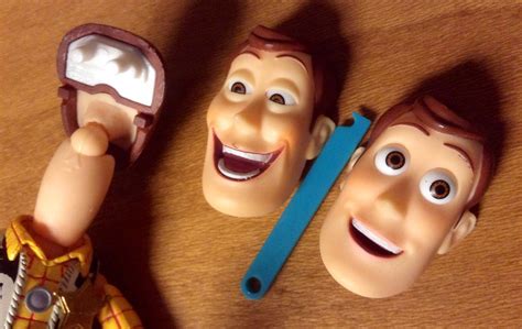 Revoltech Woody Figure Showing The Two Interchangeable Woody Faces And