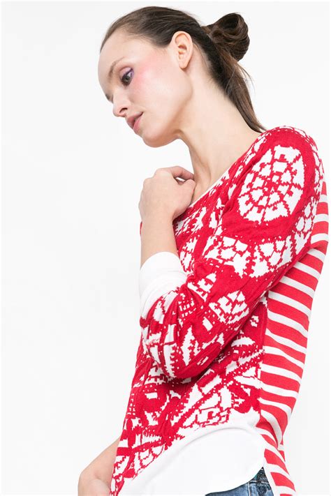 With A Nautical Red And White Stripes At The Bad And An Embroidered Orbular Print On The Front