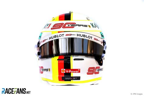 The usual germany colors in the longitudinal direction six glittering stripes are laid out over the helmet, reminiscent of a disco wallpaper from the 1970s. Sebastian Vettel helmet, 2019 · RaceFans