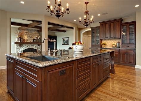 By having a center island in your kitchen, you can increase your counter space. Allow Extra Room for Dining with a Large Kitchen Islands ...