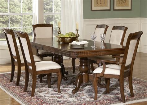 Dining room with beige walls, art and water view. Cherry Finish Double Pedestal Formal Dining Table w/Options