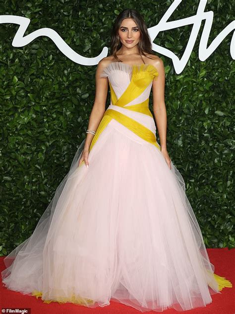 Olivia Culpo Has A Princess Moment In Yellow And White Gown As Walks