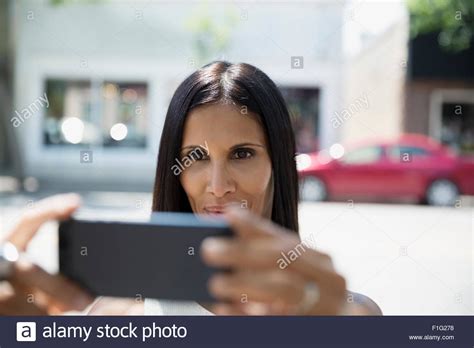 Close Up Brunette Woman Taking Selfie On Street Stock Photo Alamy