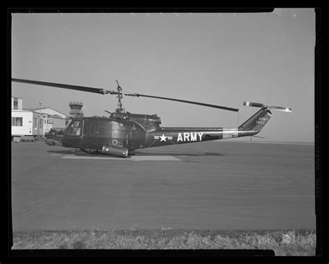 Photograph Of A Side View Of A Heavily Armed Uh 1c Iroquois Helicopter