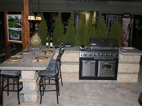 Stones, woods, and stainless steel. Outdoor Kitchens & Bars | Stone Additions | Lemke Stone