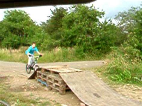 Stay tuned for the next episode! bike jump on homemade ramp - YouTube