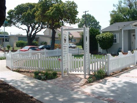 Virtually maintenance free and backed by a lifetime warranty, this classic picket fence will look new for years to come. White Vinyl Picket Fence & Gate with Arbor - Yelp