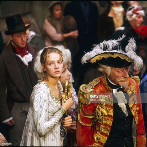 American Actress Uma Thurman And British Actor John Neville Act In A Scene Of The 1988 Movie The