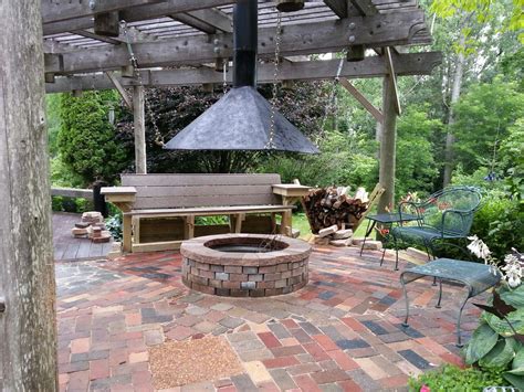 What is the most common feature for outdoor fireplaces? Patio fire pit hood | Fire pit chimney