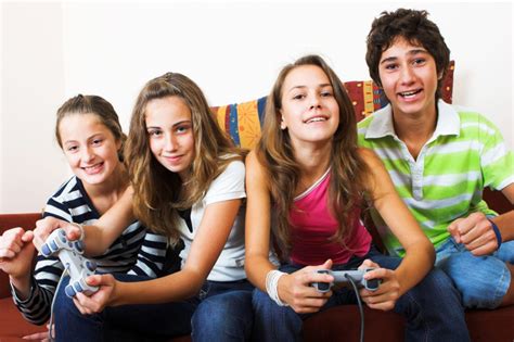 Four Teenagers Playing Video Games Together Bellingham Public Library