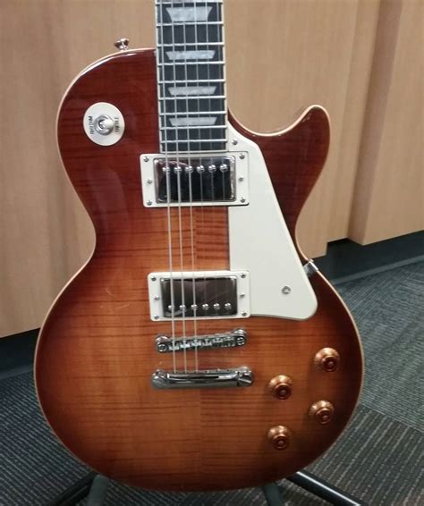 The epiphone les paul is a solid body guitar line produced by epiphone as a more modestly priced version of the famous gibson les paul. Epiphone Les Paul Standard Pro - Desertburst - Long ...