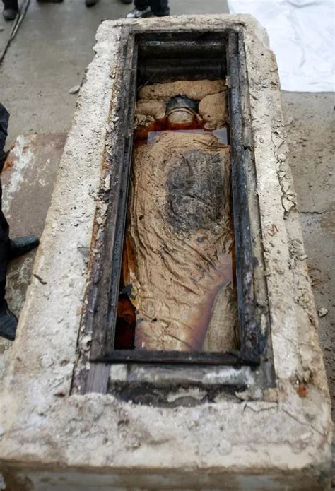 A 700 Year Old Mummy Preserved Flawlessly In Brown Liquid Appeared To
