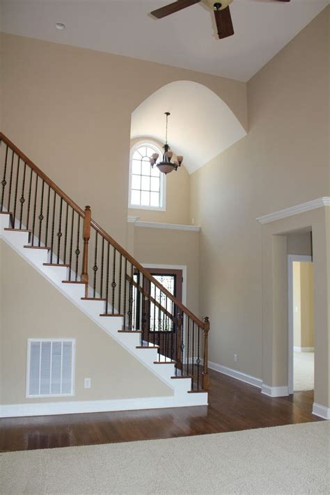 The Two Story Foyer Includes Barrel Vault Ceiling Plant