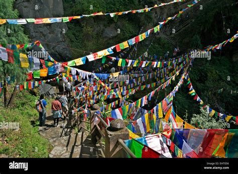 Bhutan A Plethora Of Prayer Flags By A Waterfall Near The Entrance To