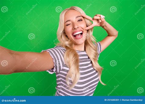 Portrait Of Carefree Positive Girl Make Selfie Arm Fingers Demonstrate V Sign Eye Wink Isolated