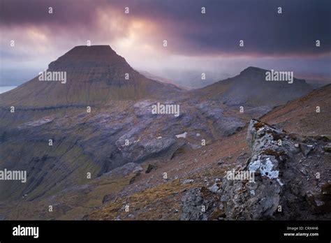 Atmospheric Sunset Over Skaelingur Mountain On The Island Of Streymoy