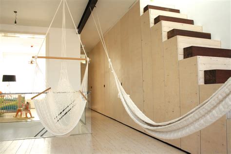 How to hang a hammock from the ceiling hunker. Chic hanging hammock chair Inspiration for Living Room Modern