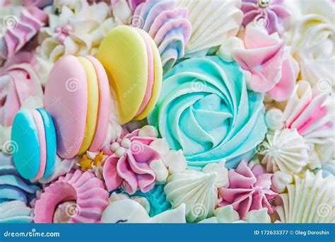 Multicolored Background Of Marshmallow Sweets Macaroon Cakes And Cream