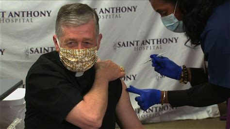 Chicagos Archbishop Gets Virus Vaccine