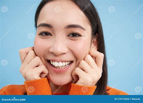 Beauty And Wellbeing Close Up Portrait Of Young Happy Asian Woman