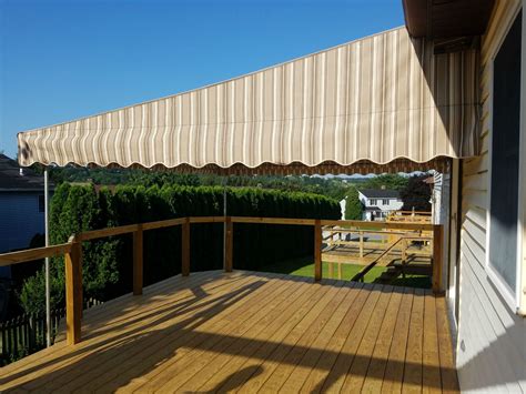 The striped, makeshift canopy provides shade, makes a bold the large arched canopy protects this outdoor deck from the elements. Beautiful shade for your deck - install a stationary ...