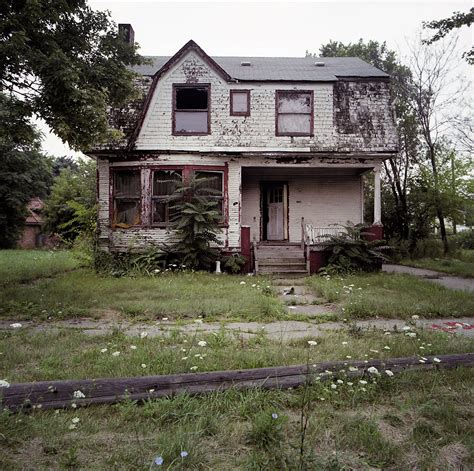 I stand there in front of the old abandoned house with my friends. 100 abandoned houses by Kevin Bauman « File Magazine