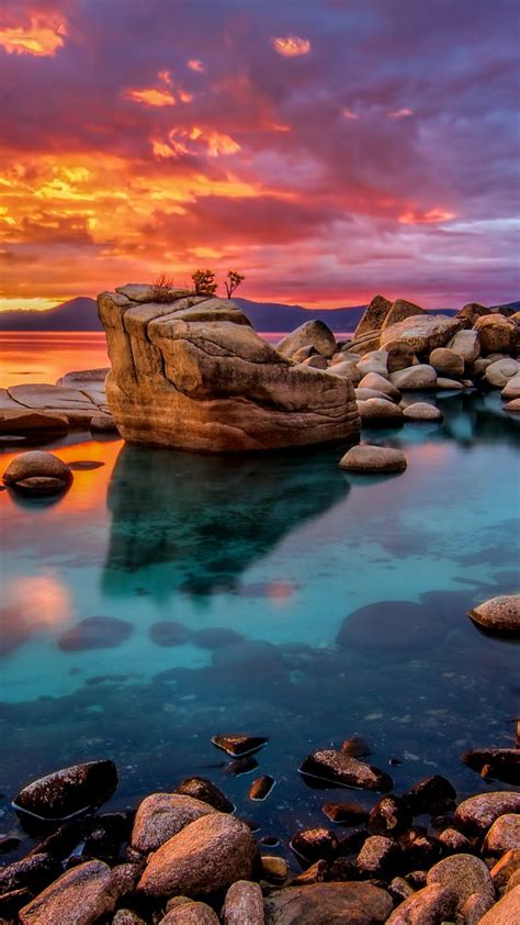Candy Colored Skies Sunset At Shoreline Of Lake Tahoe Nevada Usa
