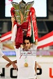 Ahmed Alaaeldin Abdelmotaal of Qatar celebrates with the trophy at ...