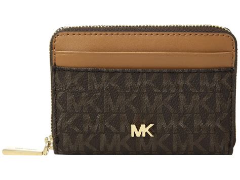 Shop over 260 top michael michael kors women's wallets & card holders and earn cash back from retailers such as baltini, cettire, and farfetch and others such as italist and michael kors all in one place. Lyst - MICHAEL Michael Kors Zip Around Coin Card Case ...
