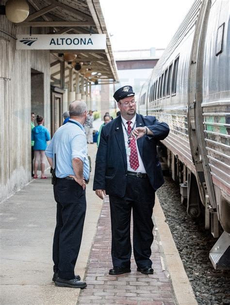 Conductor Checking His Watch 2016 — Amtrak History Of Americas Railroad