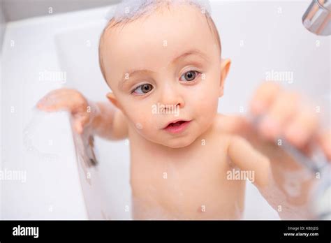 Adorable Bath Baby Boy With Soap Stock Photo Alamy
