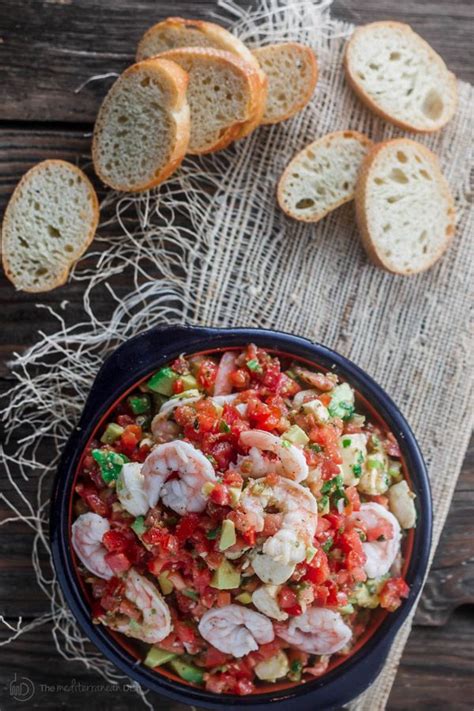 Butter, cream, parmesan cheese and pesto converge into a luxurious sauce to be served with cooked shrimp or crab meat and hot reviews for photos of creamy pesto shrimp. Shrimp Bruschetta Recipe | The Mediterranean Dish. Not ...
