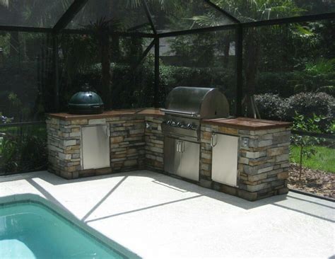 Typically, an outdoor kitchen is built atop a patio or deck surface and offers the cook and diners some sort of protection from the weather. http://diyoutdoorkitchenguide.com/terrific-outdoor-kitchen ...