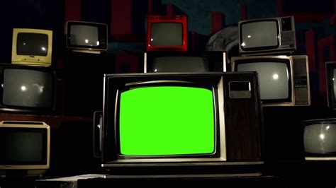 Old Tv With Green Screen In The Middle Of Many Tvs Aesthetics Of The 80s Stock Footage Ad