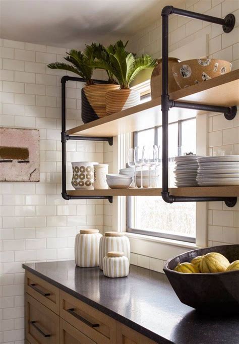 Practical wall mounted kitchen shelves featuring a sturdy stainless steel construction. Don't like the open top. Prefer drop down from ceiling ...