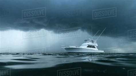 Yacht On Ominous Stormy Ocean Stock Photo Dissolve