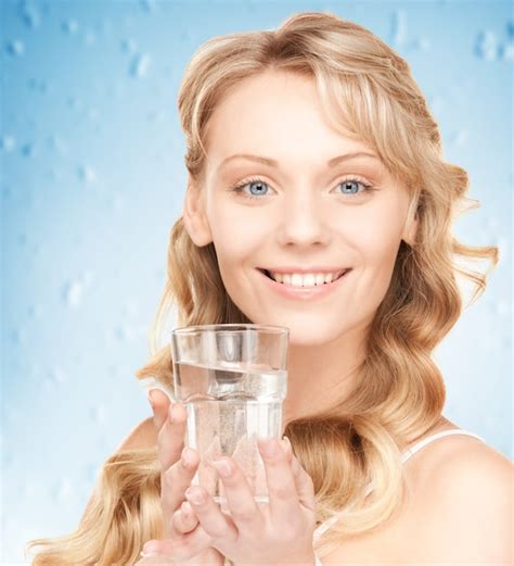 Premium Photo Closeup Picture Of Woman Hands Holding Glass Of Water