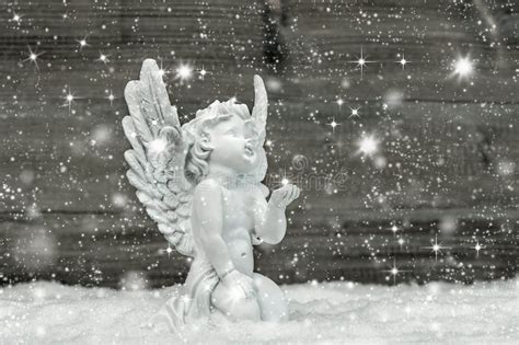 Angel In Snow Snowflakes And Stars Christmas Decoration Stock Image