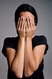 View "Black-haired Woman Covering Her Face With Hands" by Stocksy ...
