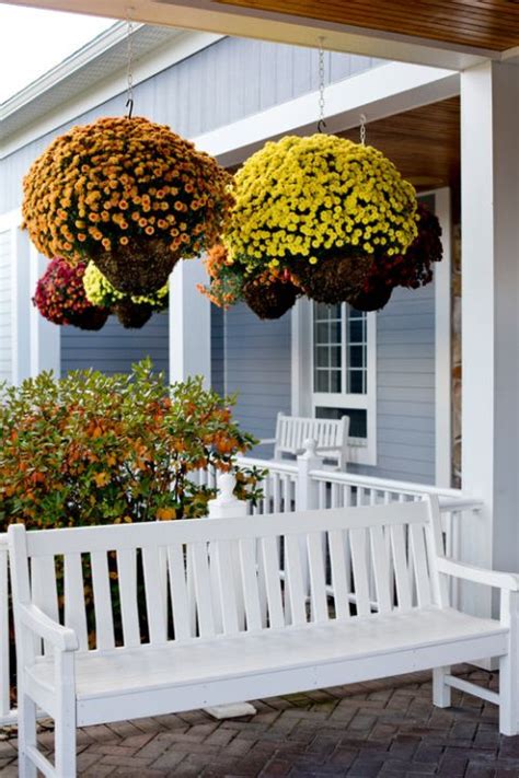 Create Fall Curb Appeal With Pumpkins And Mums Town And Country Living