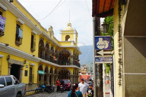 Urban View Of A Busy Narrow Street With Traditional Shops In A Village