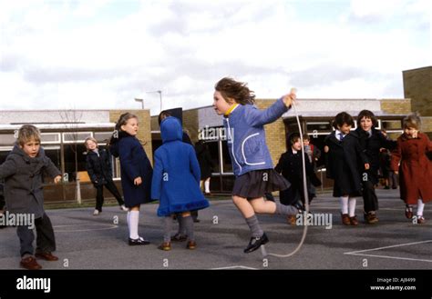 Children Playing In School Yard At Primary School Stock Photo Alamy