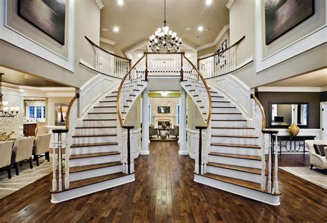 Impressive Two Story Foyer With Dual Staircase Foyer Design